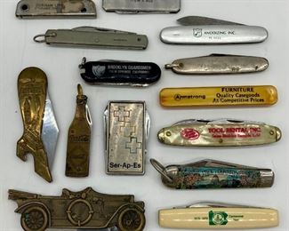 Various vintage advertising pocket knives including Coca-Cola and U.S. Capitol souvenir