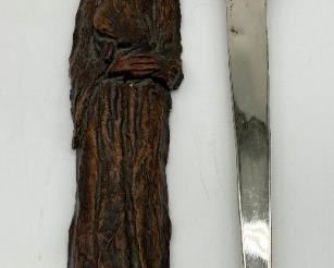 Vintage wooden man dagger