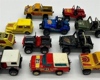 Various vintage metal toy trucks, jeeps