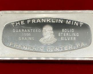 The Franklin Mint solid sterling silver (guaranteed 1000 grains) Christmas 1973 ingot in case