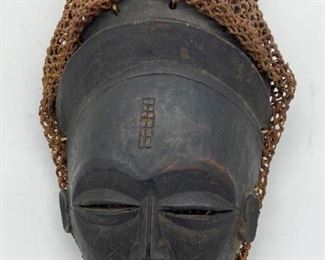 Vintage dark wood mask