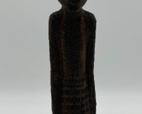 Hand-carved statue signed OZIEGBE