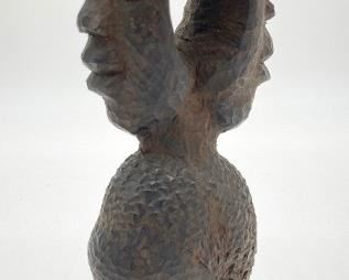 Hand-carved wooden bust signed OZIEGBE