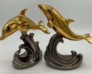 MCM Art Deco gold and silver dolphins (set of 2)