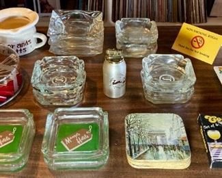 Various glass and ceramic ashtrays