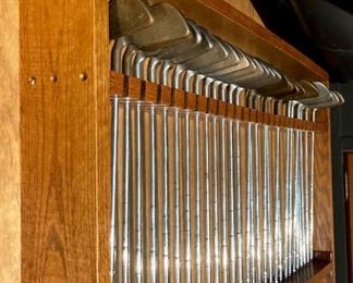 Hundreds of golf clubs, golf club display wall racks