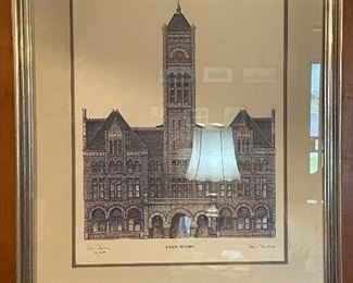 Stately artwork in a gold frame.