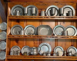 Pewter collection of plates, mugs, bols, pitchers, sugar, creamer and more.