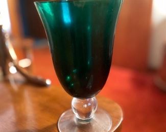 Green glass goblets.
