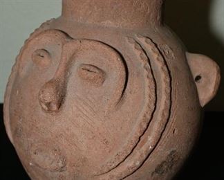 Pre-Columbian human face vessel-200-500AD. This piece is about 18-22" in diameter