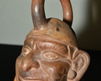 Pre-Columbian Moche portrait stirrup vessel