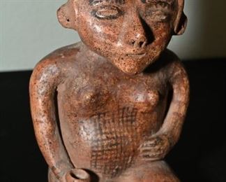 Pre-Columbian Jalisco female-The Jalisco tattoo the body with etchings such as the one on her belly.