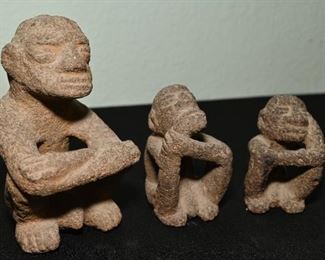 Pre-Columbian volcanic stone figures.  Appears to say speak no evil, see no evil, hear no evil. 