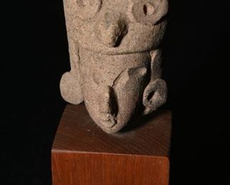 Pre-Columbian deity on wood base