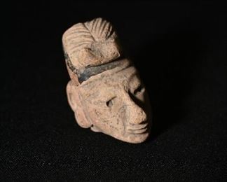 Pre-columbian carved head deity