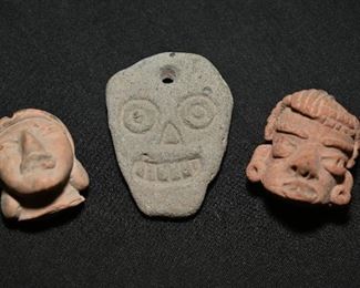Pre-Columbian head trio-the one on the right is Nayarit and I believe the skull in middle is Mayan. Very tiny-about 1.5"