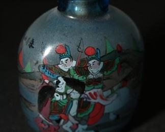 Reverse painted Asian snuff bottle-signed at the top of the bottle. 