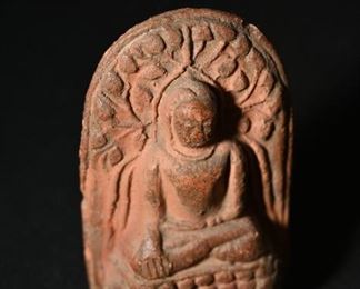 Carved stone buddha amulet