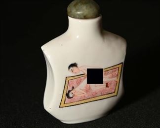 Chinese porcelain erotic snuff bottle.  Signed on the base.  Famille rose colors. We have 3 of these with different scenes.  Freeman's sold one for $1200.00.  Late 19th century. 