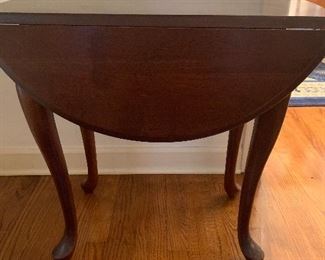 Oval drop leaf table, excellent condition $200.00.