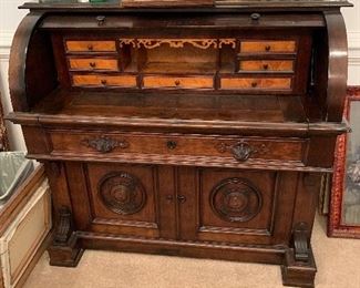 Antique roll top desk.  Put together with wooden pegs. Gorgeous piece.  Price: $1200.00