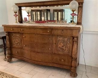 Mirrored Carved oak buffet. Matches the China cabinet. Another beautiful piece. 73x25x62.  $1050.00