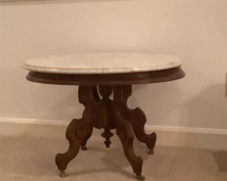 Marble oval coffee table. 29x23x20. $100.00