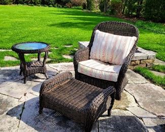 All weather Wicker chair and ottoman. Side table