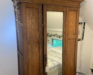 Beautiful antique tiger oak hutch closet with front mirror