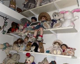 Large collection of various types of dolls