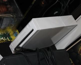 Wii - complete with wheels, remotes, cables, games available for purchase separately