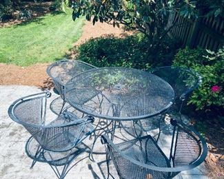 WROUGHT IRON TABLE WITH 4 CHAIRS