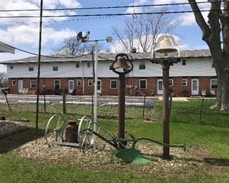 School yard bells with or without the post, a milk cart, a John Deere green single blade plow (we have two), rooster wind director, another metal wheel.