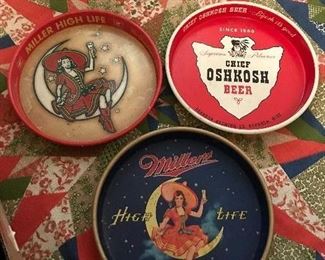 Chief Oshkosh beer tray and two Miller High Life beer trays.