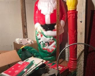 Yes we have Christmas stuff including a ~48” Santa and candle blow molds. Note the yardstick is from Brammel’s Furniture Store (1910-1940) Fort Atkinson.