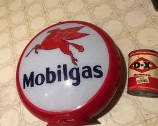 Here is the topper for the Mobil gas pump.       On the right is a D-X motor oil can. (Full)