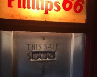 A close up view of Phillips 66 gas pump.