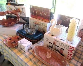 Some of many boxed kitchen and dining items