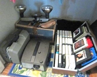 Vintage 8mm projector, slide projector, light bar & box of 8-track tapes