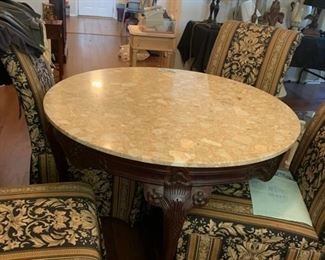 Gorgeous marble topped carved mahogany table