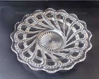 Vintage Serving Plate With A Scalloped Edge And Curved Teardrop Design