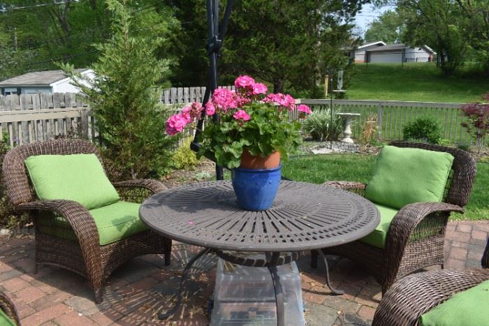 Outdoor Round Iron Table and 2 Ratan Arm Chairs with Cushions - Great Shape!