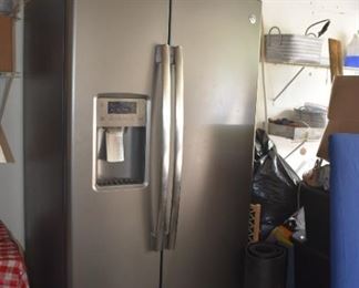 French Door GE Refrigerator with Ice Maker and Water on Door 