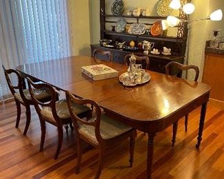 Antique Mahogany Dining Table c. 1840. Six Rosewood Victorian Dining Chairs c.1840. antique English Welch Cupboard in background. C. 1800.