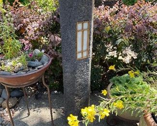 Asian Garden Sculpture. Window lights up with batteries.