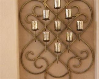 Iron wall decor and candles