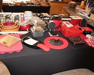 Red kitchen accessories and pans