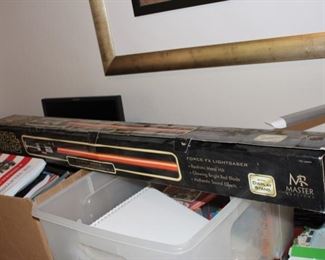Replica of the original Star Wars lightsaber, used but with box