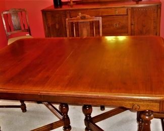 Beautiful antique dining table with matching chairs and sideboard