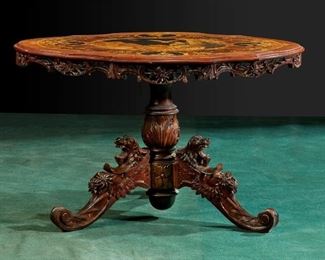 A German Black Forest marquetry tilt-top table